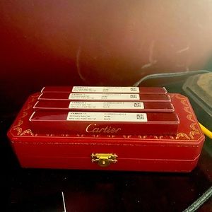 Cartier Santos ballpoint pen with 4 black medium refills.